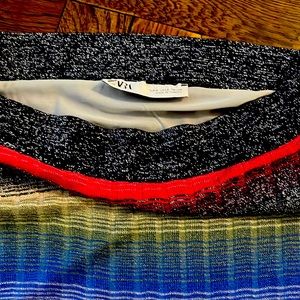 Multi colored midi skirt. Wear with tee, blouse or sweaters. Boots or sneakers